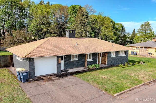 103 W Michigan Ave, Ironwood, MI 49938 - single story home featuring a chimney, driveway, a porch, an attached garage, and roof with shingles