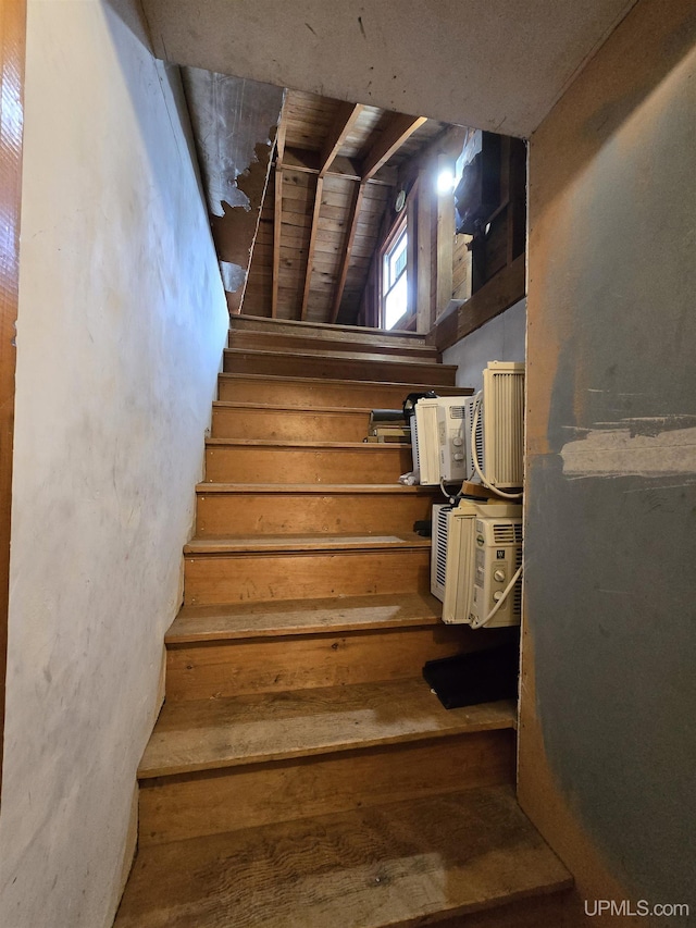 817 W Water St, Hancock, MI 49930 - staircase featuring wood-type flooring