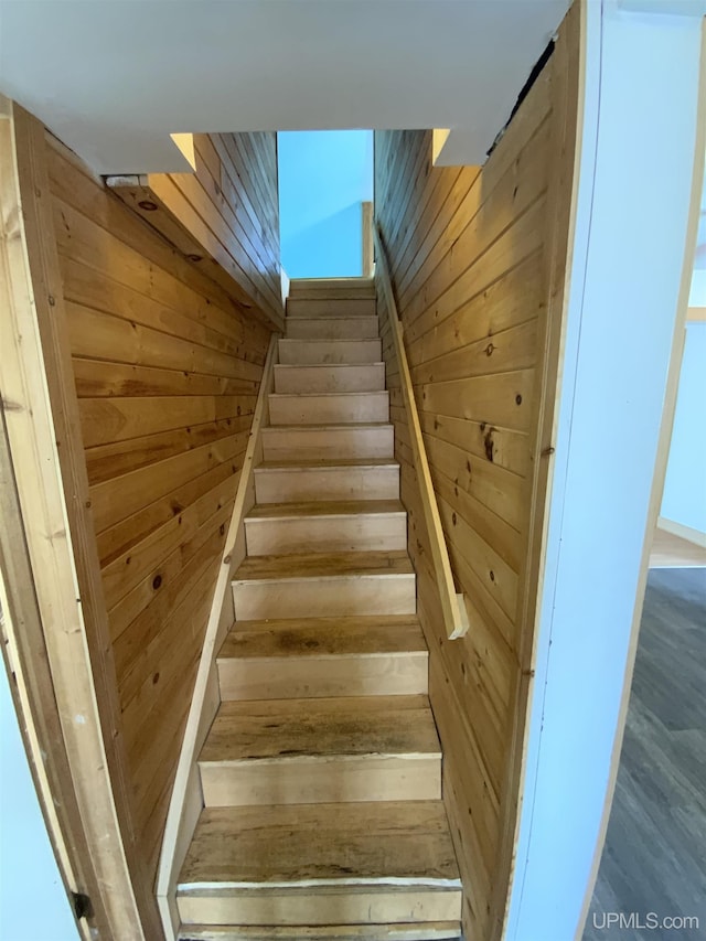 331 W Bluff St, Marquette, MI 49855 - stairs with wood walls and wood finished floors