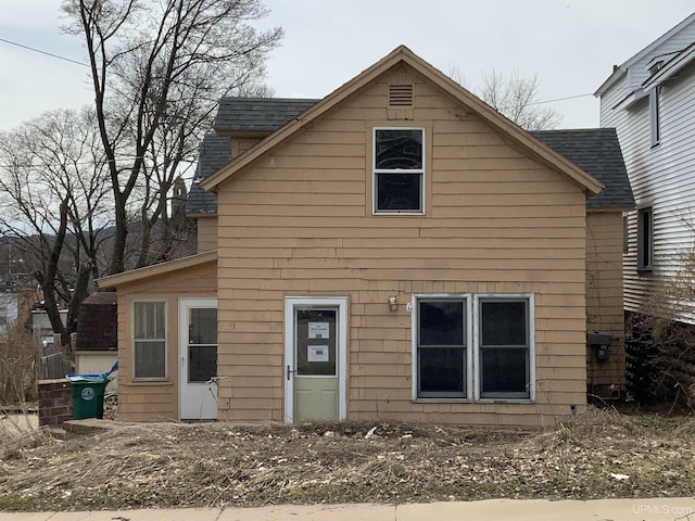 331 W Bluff St, Marquette, MI 49855 - view of front facade featuring a shingled roof