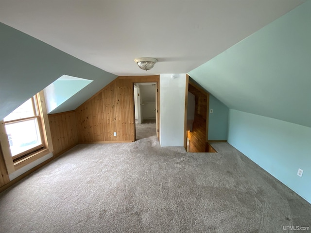 331 W Bluff St, Marquette, MI 49855 - bonus room with carpet, vaulted ceiling, and wooden walls