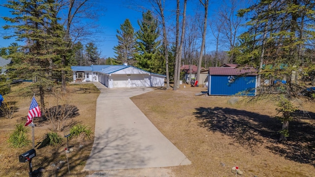 5001 Ruby Dr, Gladwin, MI 48624 - view of yard with a garage