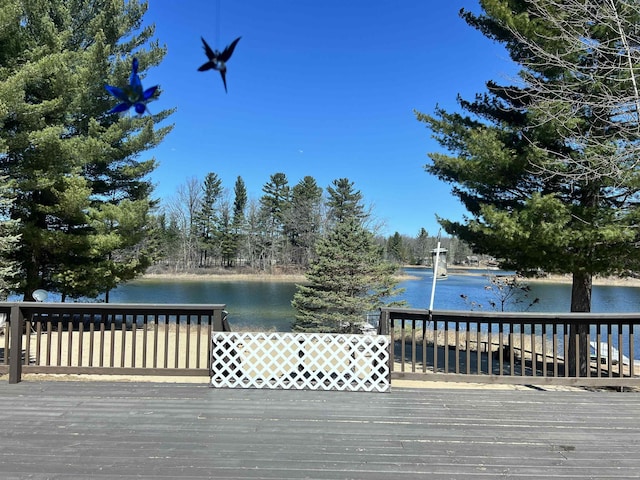 5001 Ruby Dr, Gladwin, MI 48624 - deck with a water view