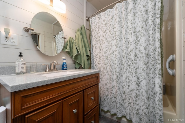 546N W Gulliver Lake Rd, Gulliver, MI 49840 - bathroom with vanity and wooden walls