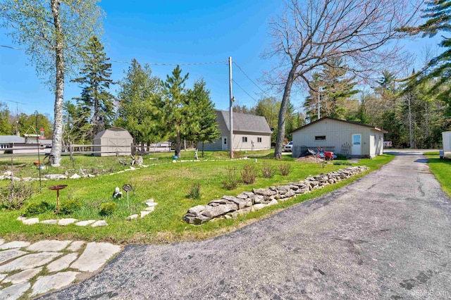 546N W Gulliver Lake Rd, Gulliver, MI 49840 - view of yard with an outbuilding