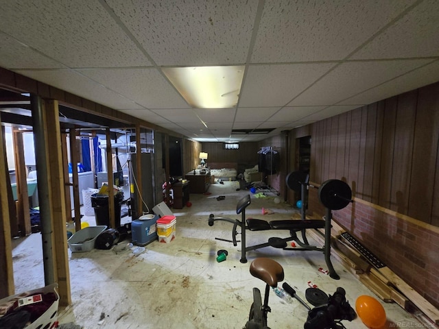 711 Moore St, Owosso, MI 48867 - finished below grade area with a drop ceiling and wooden walls