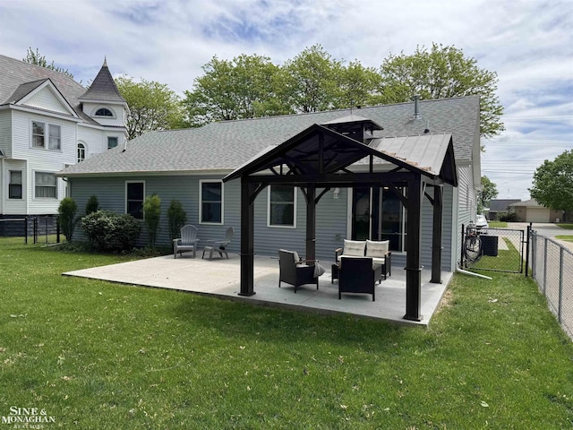 1741 Saint Clair River Dr, Algonac, MI 48001 - rear view of house with outdoor lounge area, a patio, roof with shingles, and a gate