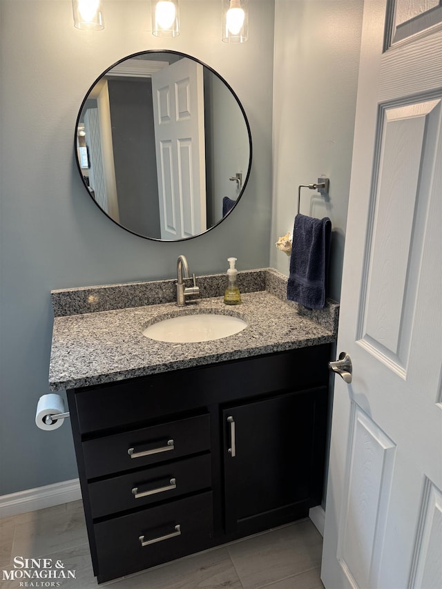 1741 Saint Clair River Dr, Algonac, MI 48001 - bathroom with vanity and baseboards