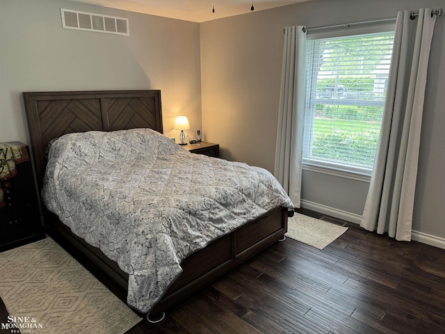 1741 Saint Clair River Dr, Algonac, MI 48001 - bedroom featuring baseboards and dark wood finished floors