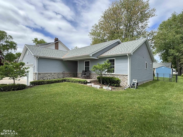 1741 Saint Clair River Dr, Algonac, MI 48001 - view of front of house featuring stone siding, an attached garage, a shingled roof, and a chimney