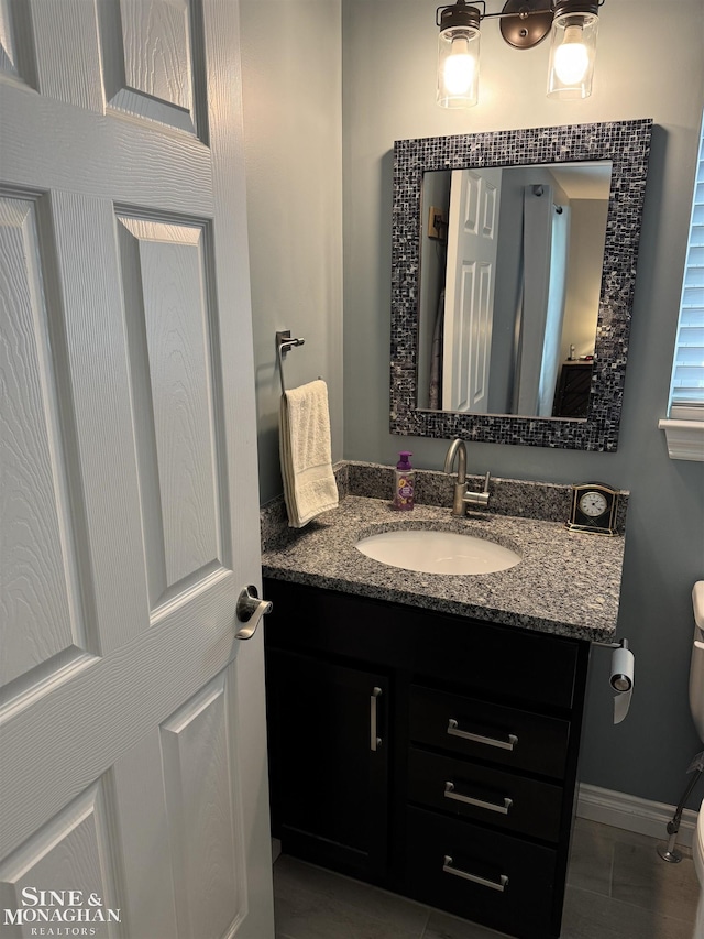 1741 Saint Clair River Dr, Algonac, MI 48001 - bathroom with vanity, toilet, and tile patterned floors