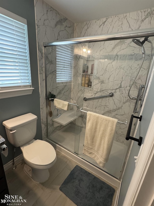1741 Saint Clair River Dr, Algonac, MI 48001 - bathroom with toilet, a marble finish shower, and baseboards
