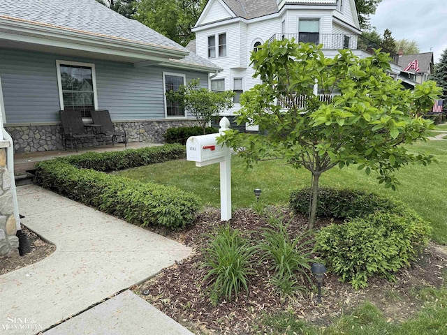 1741 Saint Clair River Dr, Algonac, MI 48001 - exterior view of roof with shingles and a downspout