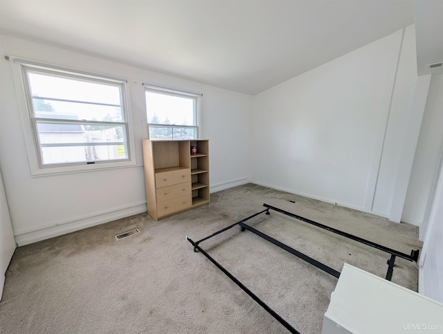 116 Caribou St, Gwinn, MI 49841 - unfurnished bedroom featuring carpet and baseboards