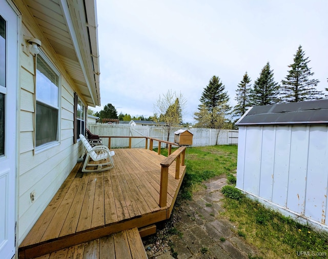 116 Caribou St, Gwinn, MI 49841 - wooden terrace featuring a fenced backyard