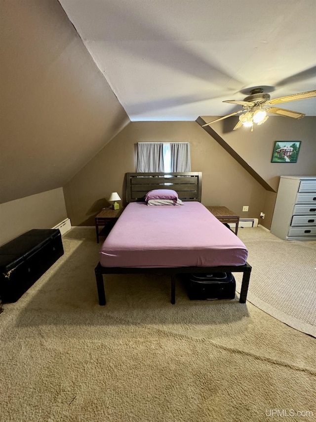 584 Elliott Ave, Ishpeming, MI 49849 - bedroom with carpet floors, lofted ceiling, a ceiling fan, and a baseboard heating unit