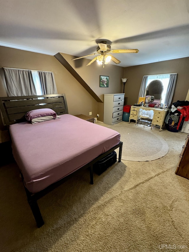 584 Elliott Ave, Ishpeming, MI 49849 - carpeted bedroom with a ceiling fan