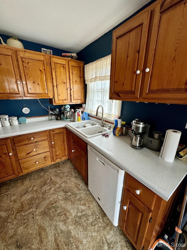 584 Elliott Ave, Ishpeming, MI 49849 - kitchen featuring a sink, dishwasher, brown cabinets, and light countertops