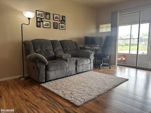 8401 18 Mile Rd Unit 154, Sterling Heights, MI 48313 - living room featuring wood finished floors and a desk