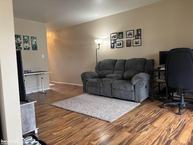 8401 18 Mile Rd Unit 154, Sterling Heights, MI 48313 - living area featuring wood finished floors, an office area, and baseboards