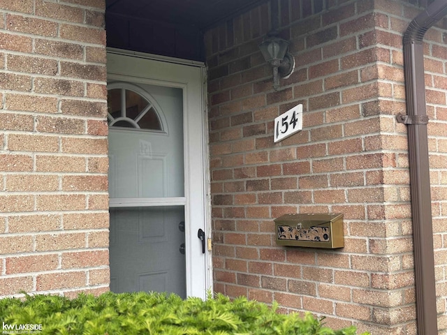 8401 18 Mile Rd Unit 154, Sterling Heights, MI 48313 - entrance to property featuring brick siding