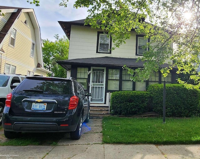 702 Prospect St, Flint, MI 48503 - traditional style home with roof with shingles and entry steps