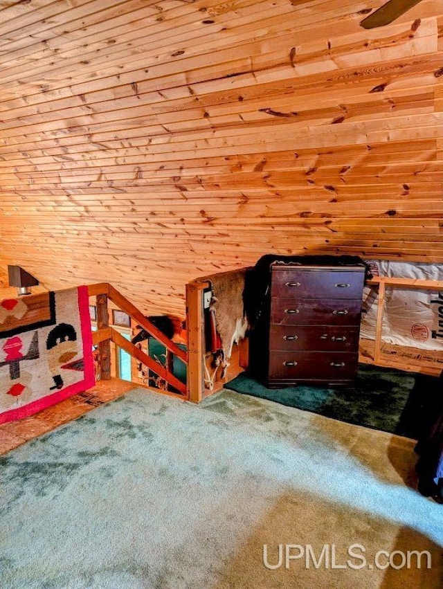 325 Mastodon Rd, Crystal Falls, MI 49920 - unfurnished bedroom with carpet floors and wooden walls