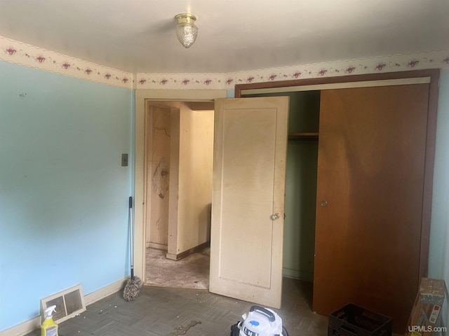 210 Birch St, Hancock, MI 49930 - unfurnished bedroom featuring baseboards