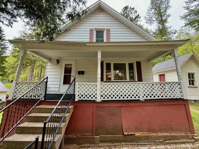 300 Jasper St, Ishpeming, MI 49849 - bungalow with a porch