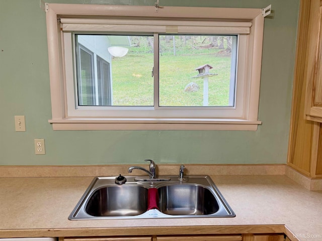 300 Jasper St, Ishpeming, MI 49849 - kitchen featuring a sink and light countertops