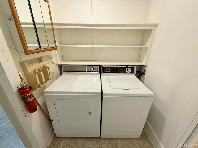 300 Jasper St, Ishpeming, MI 49849 - laundry room featuring independent washer and dryer and baseboards