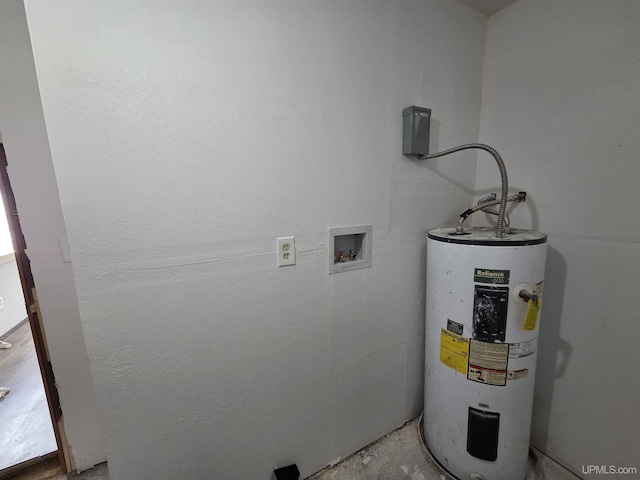 601 Range St, Manistique, MI 49854 - washroom with water heater and hookup for a washing machine