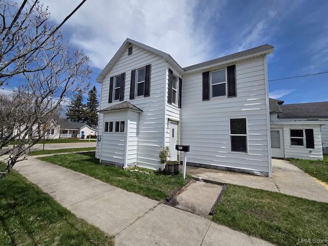 601 Range St, Manistique, MI 49854 - view of front of property featuring a front yard