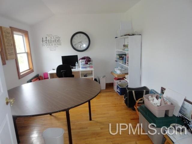 201 E Jewell St, Munising, MI 49862 - office space with light wood-style flooring and vaulted ceiling