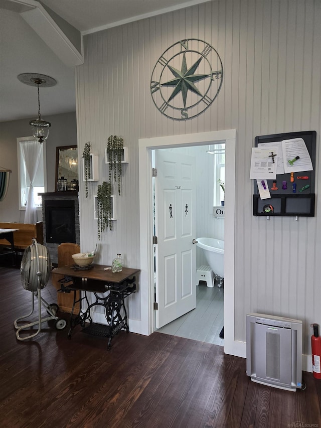 2450 N Lakeshore Rd, Carsonville, MI 48419 - entrance foyer featuring wood finished floors, a fireplace, and baseboards