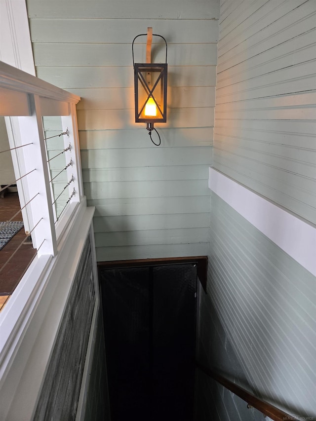2450 N Lakeshore Rd, Carsonville, MI 48419 - staircase with wooden walls