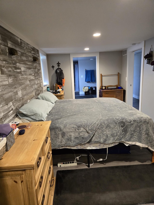 2450 N Lakeshore Rd, Carsonville, MI 48419 - bedroom featuring recessed lighting and an accent wall