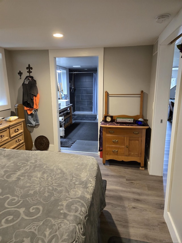 2450 N Lakeshore Rd, Carsonville, MI 48419 - bedroom featuring wood finished floors and recessed lighting