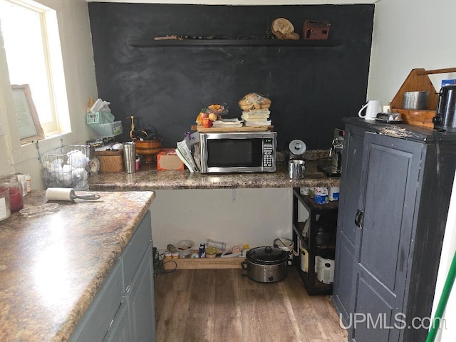 439 Hecla St, Lake Linden, MI 49945 - detailed view of stainless steel microwave and wood finished floors