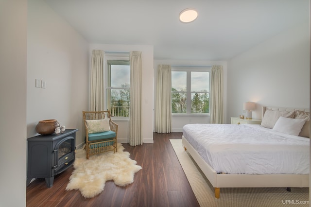 776 S Lakeshore Blvd, Marquette, MI 49855 - bedroom featuring dark wood finished floors and baseboards