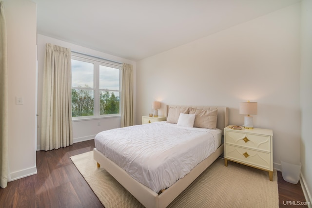 776 S Lakeshore Blvd, Marquette, MI 49855 - bedroom featuring baseboards and wood finished floors