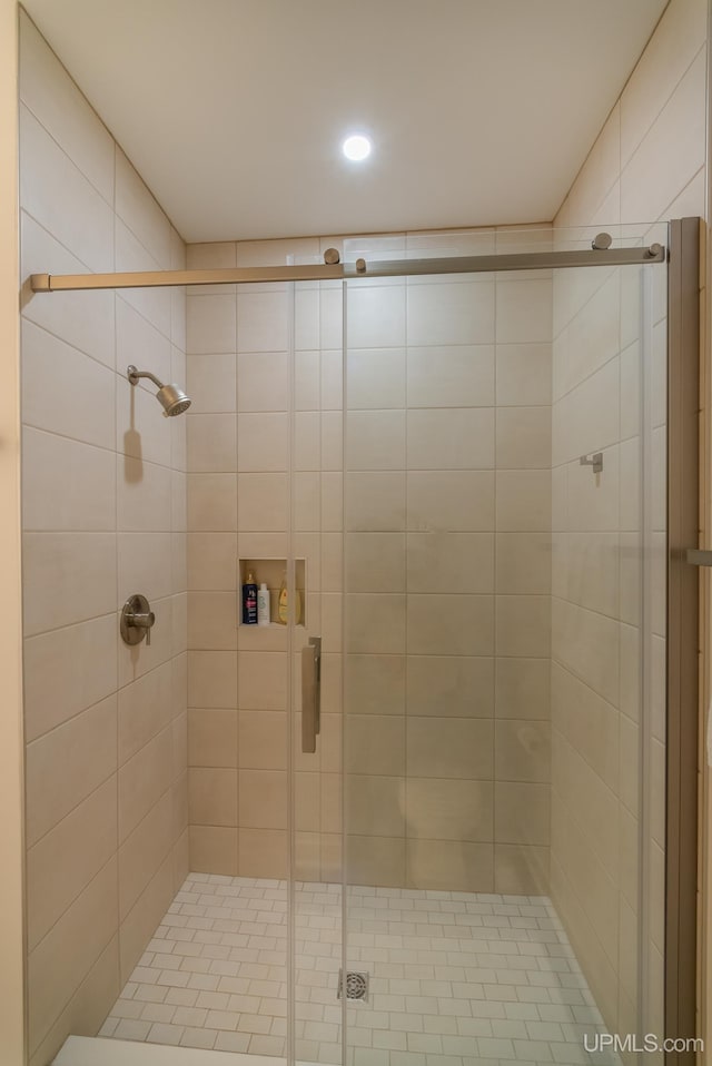 776 S Lakeshore Blvd, Marquette, MI 49855 - bathroom featuring a stall shower and recessed lighting