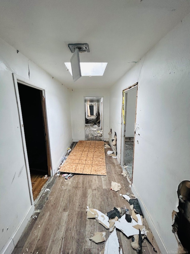 16600-16620 Greenfield Rd, Detroit, MI 48235 - corridor featuring a skylight, wood finished floors, and baseboards