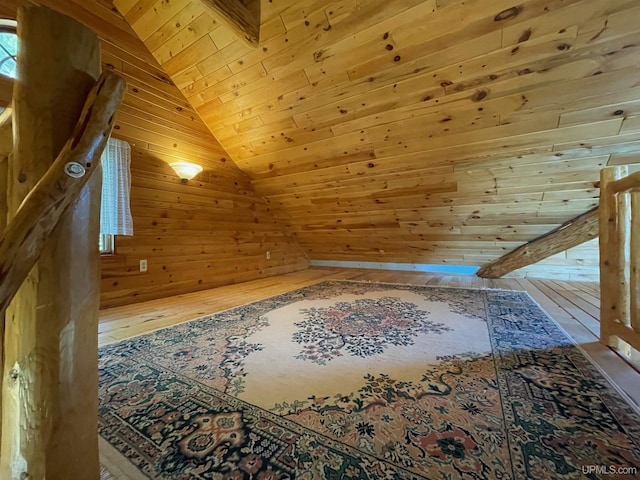 6856 Five Mile Point Rd, Allouez, MI 49805 - additional living space featuring wooden ceiling, lofted ceiling, wooden walls, and wood-type flooring