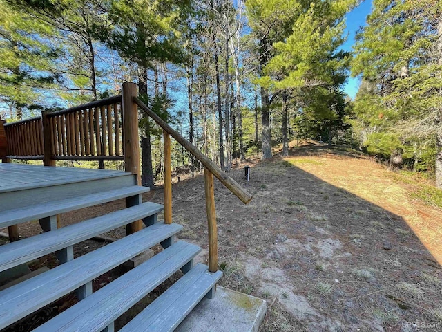 6856 Five Mile Point Rd, Allouez, MI 49805 - view of yard featuring stairway and a wooden deck