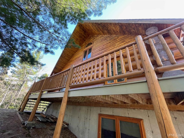 6856 Five Mile Point Rd, Allouez, MI 49805 - view of side of property with a wooden deck