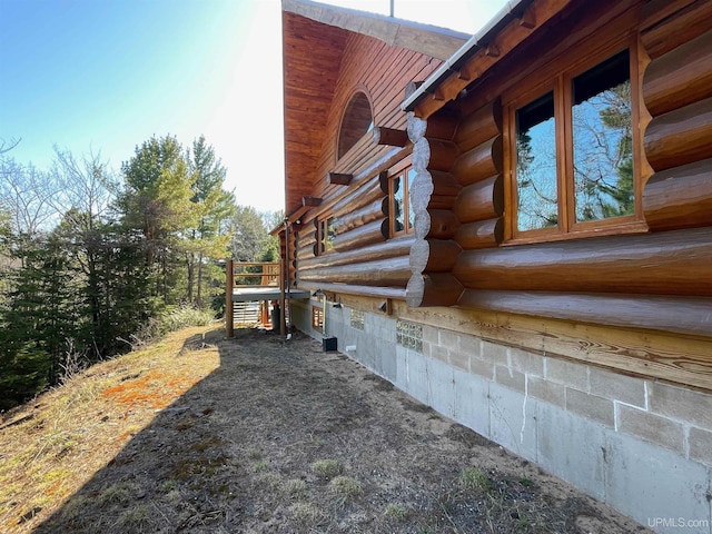 6856 Five Mile Point Rd, Allouez, MI 49805 - view of side of property with log exterior