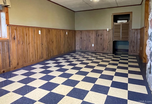 6856 Five Mile Point Rd, Allouez, MI 49805 - empty room featuring wainscoting and light flooring