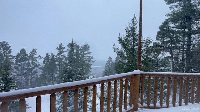 6856 Five Mile Point Rd, Allouez, MI 49805 - view of snow covered deck