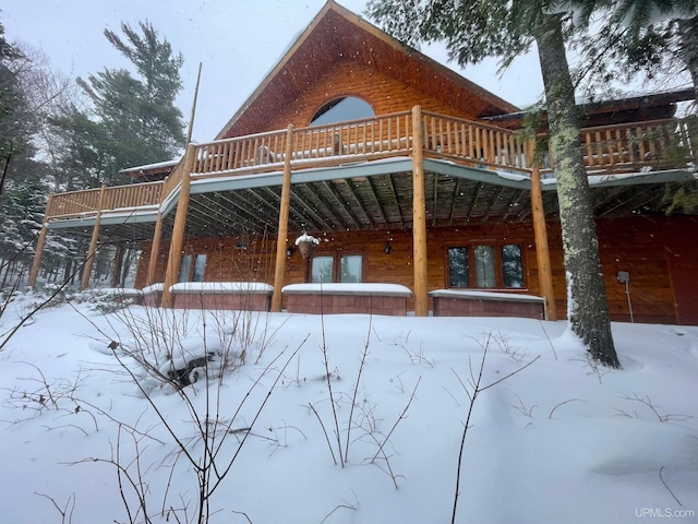 6856 Five Mile Point Rd, Allouez, MI 49805 - view of snowy exterior with a wooden deck
